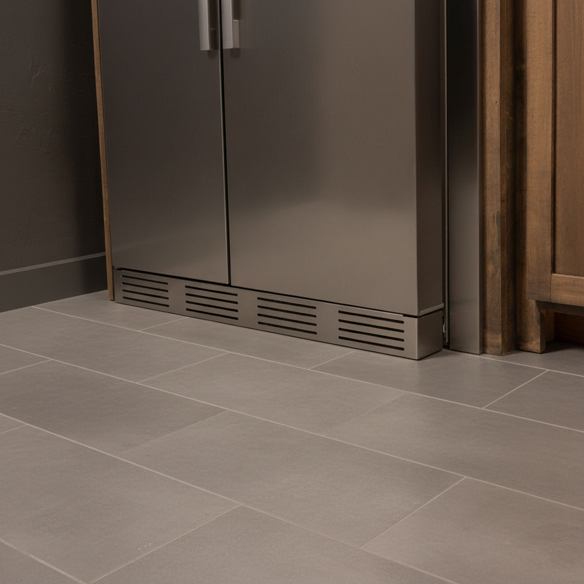 Close-up view of Refrigerator Bottom Grille perfectly installed for seamless finish