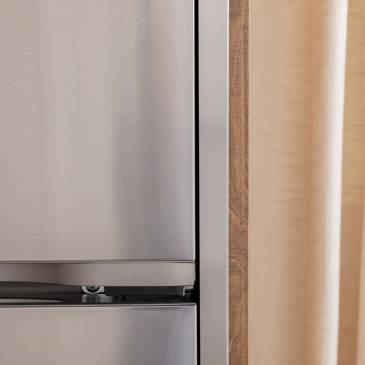 Side view of a custom trim kit showing the depth and flush fit for a refrigerator installation